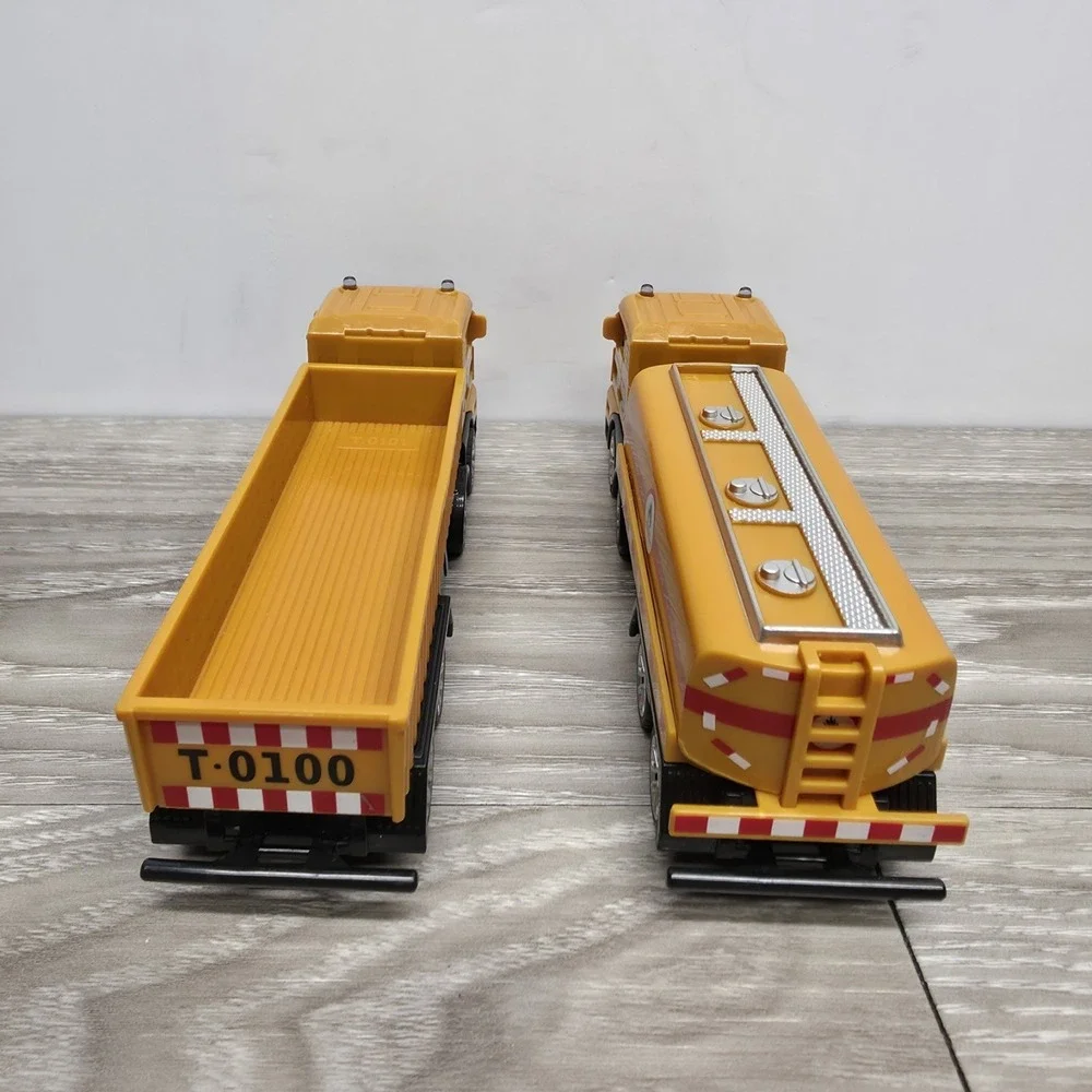 DLX Builder equipment/trucks lot - 2 Hauling Trucks